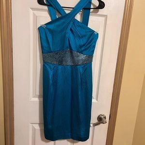 Beautiful cocktail teal blue dress for a guest of a wedding